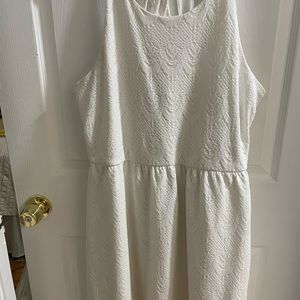 White dress with cross cross detail in back